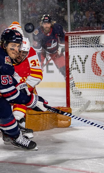 Little lifts Jets past Flames 2-1 in OT in Heritage Classic